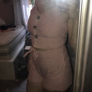 Two piece set with shorts and crop top with belt